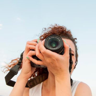 imgi_2_low-angle-woman-with-camera_23-2148518220